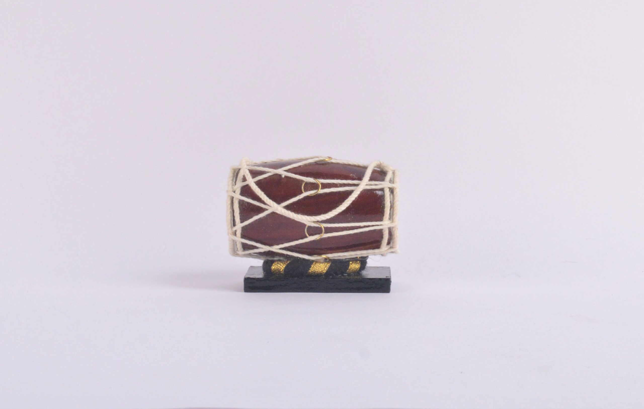 Handcrafted wooden Dholak miniature instrument