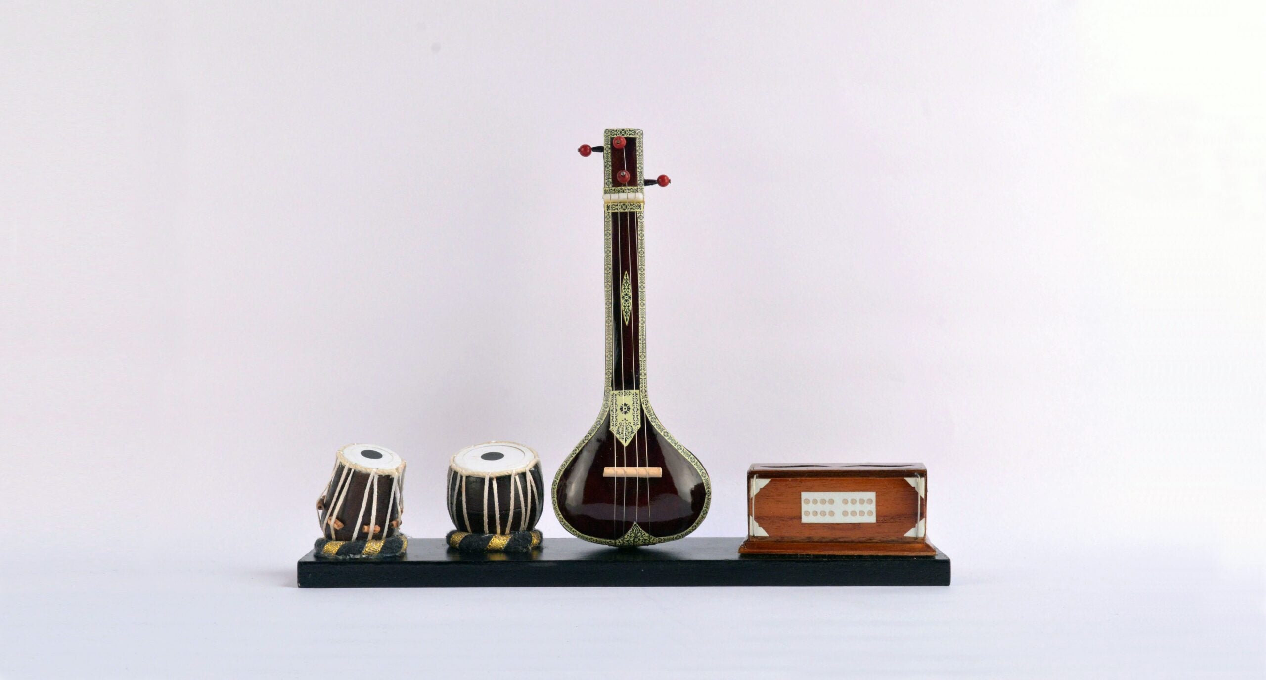 Handcrafted wooden miniature misical instrument